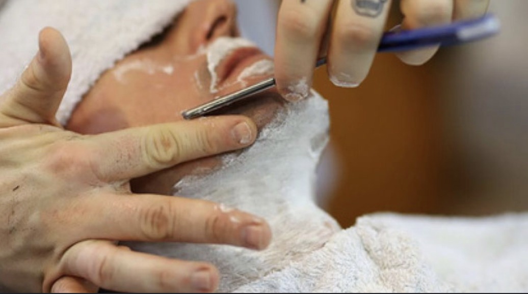 Men’s haircut and shave at barbershop and 2 men’s hair products